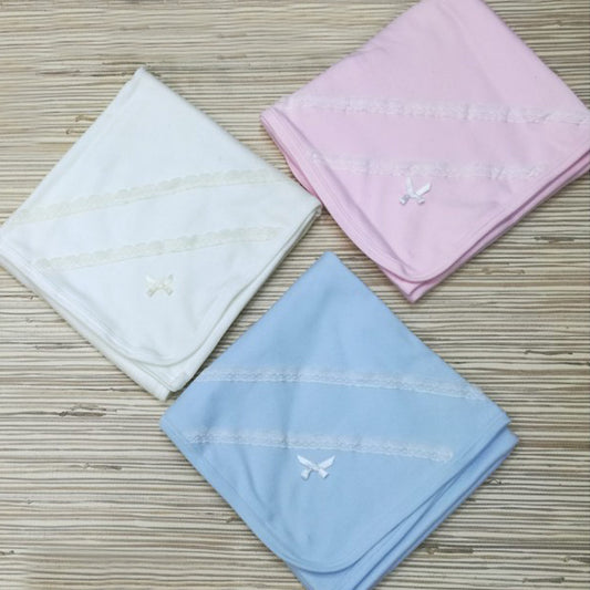 Arrullo de algodón con puntilla