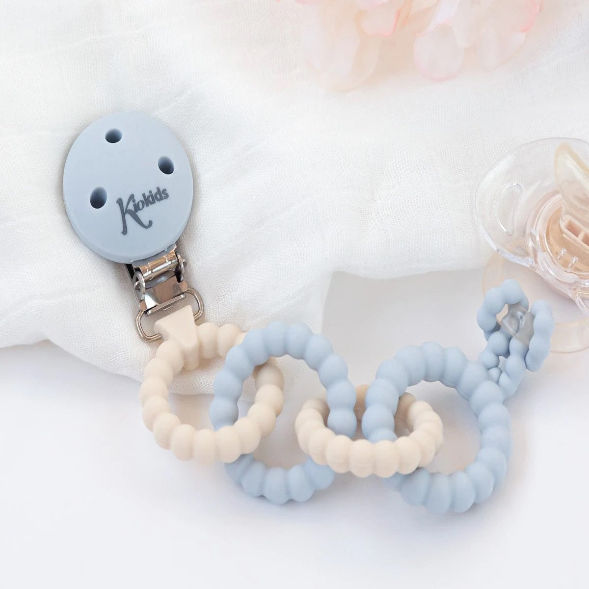 Broche de silicona azul para chupetes