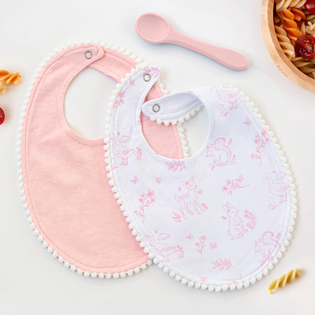 Set baberos + cuchara bebé rosa