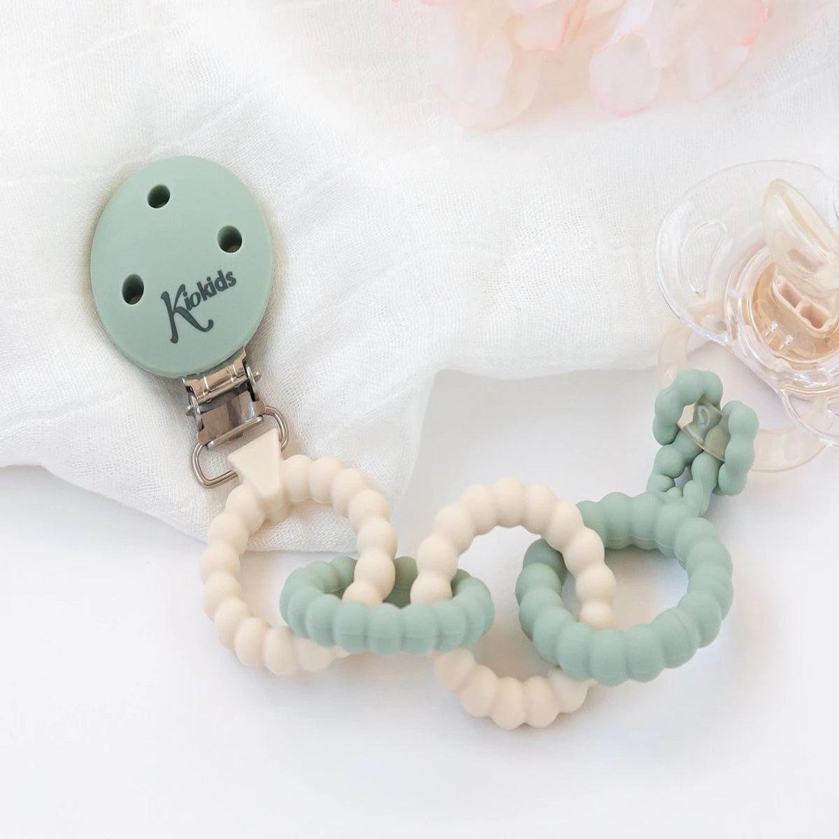 Broche de silicona verde para chupetes